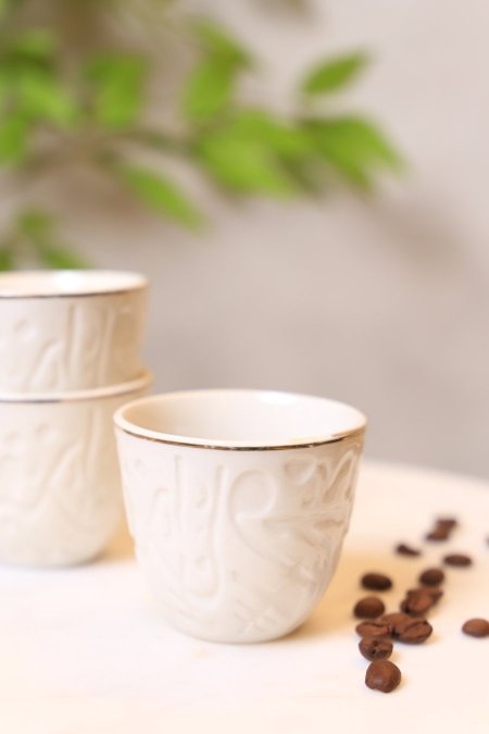 فناجين قهوة سادة 12 بورسلان ابيض مزخرف