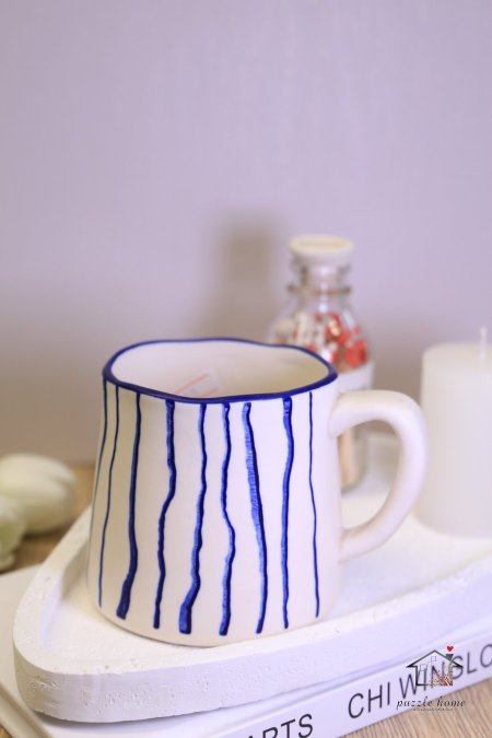 مجّ مخطط ازرق وابيض